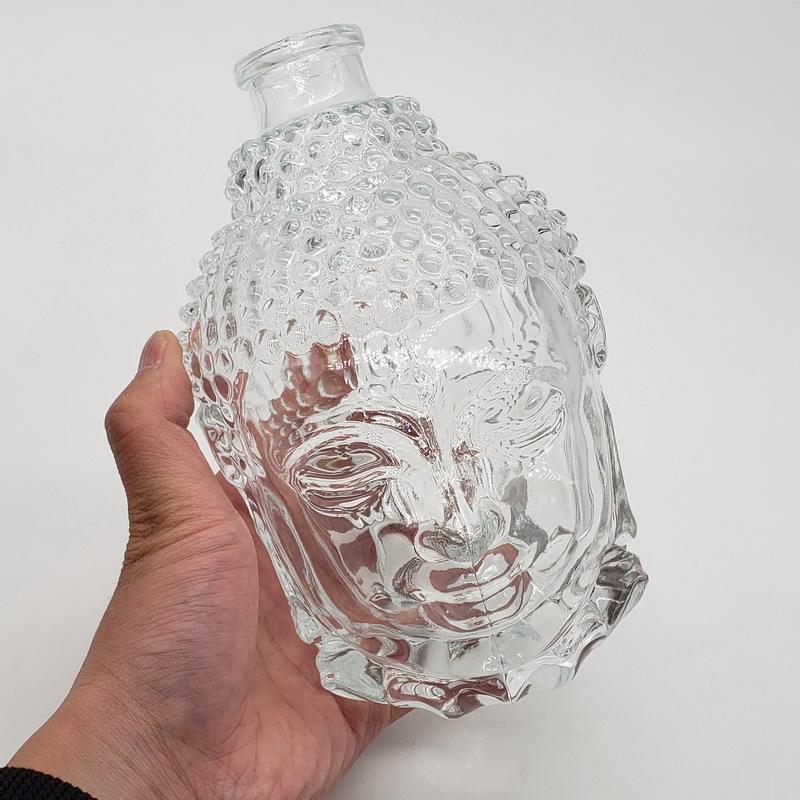 Best Sell 750ml clear Glass Wine Bottle with Buddha Head Design Buddha Head Liquor Bottle clear Glass with Wood Cork Bulk Sale