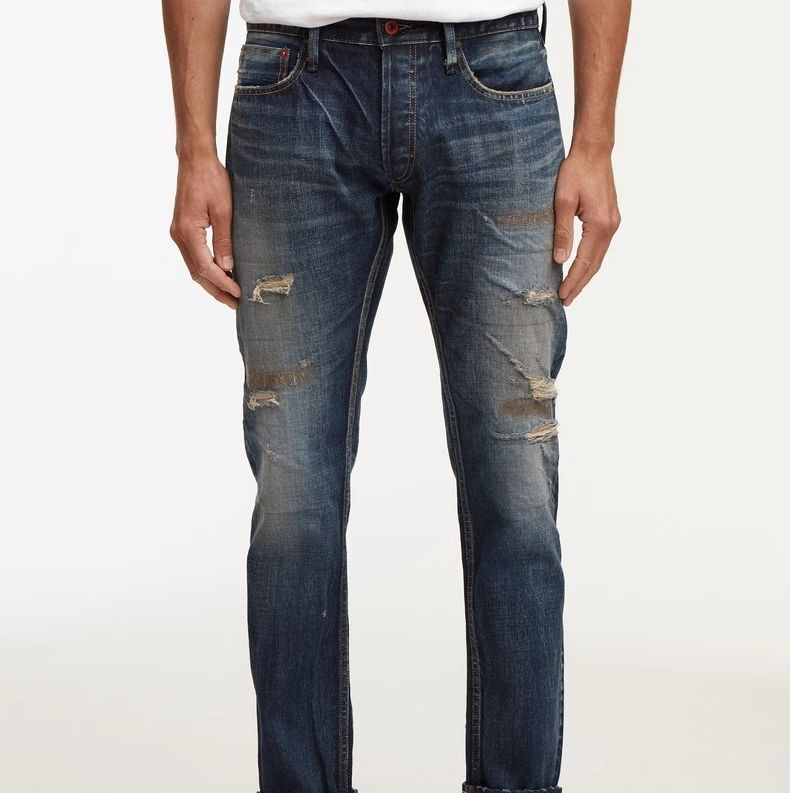 Classic Blue Jeans with Distressed Detailing for Everyday Wear