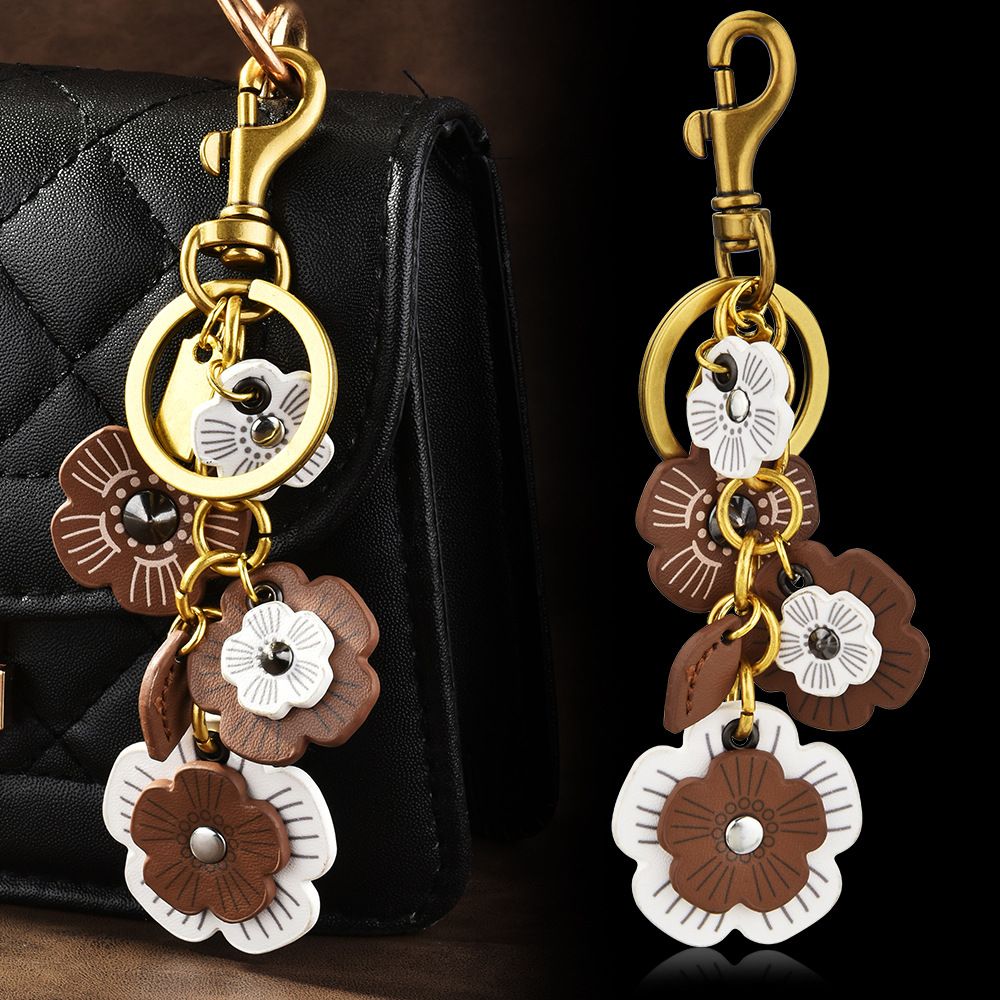 Wholesale of New Arrival Extended Chain Bag Pendants Flower Chain Accessories and Keychains