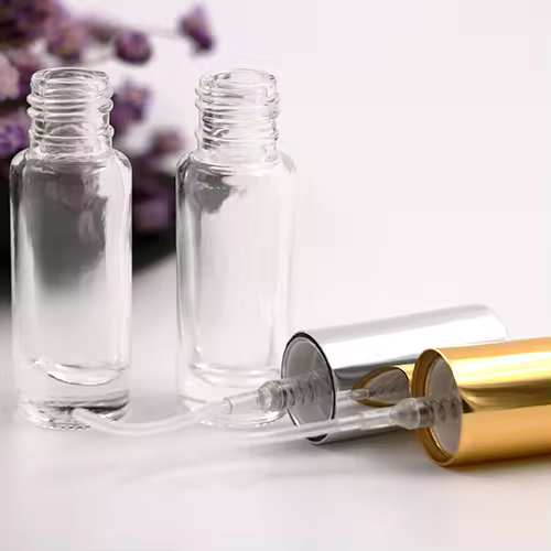 Low Moq 4ml Clear Glass Perfume Spray Bottle With Shiny Golden Or Silver Pump And Cap For Fragrance Oil Glass Atomizer