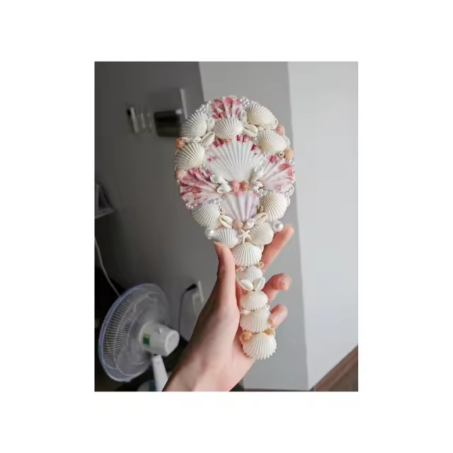 Durable Shell Hair Comb Crafted From Authentic Ocean Shells With A Comfortable Grip And Smooth Teeth Suitable For Various Hair